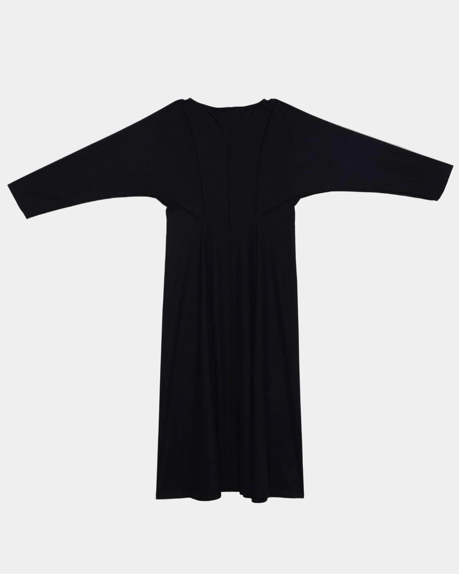 Black dress on a light gray background