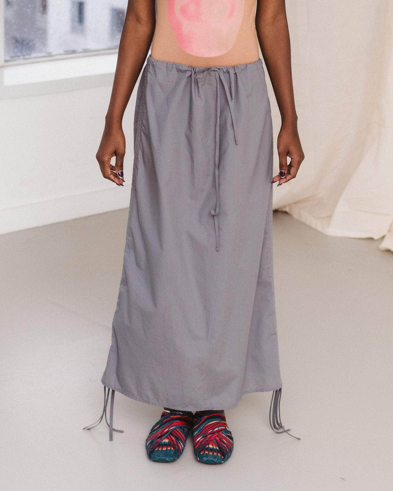 PICTORIAL STRAP SKIRT BY BASERANGE