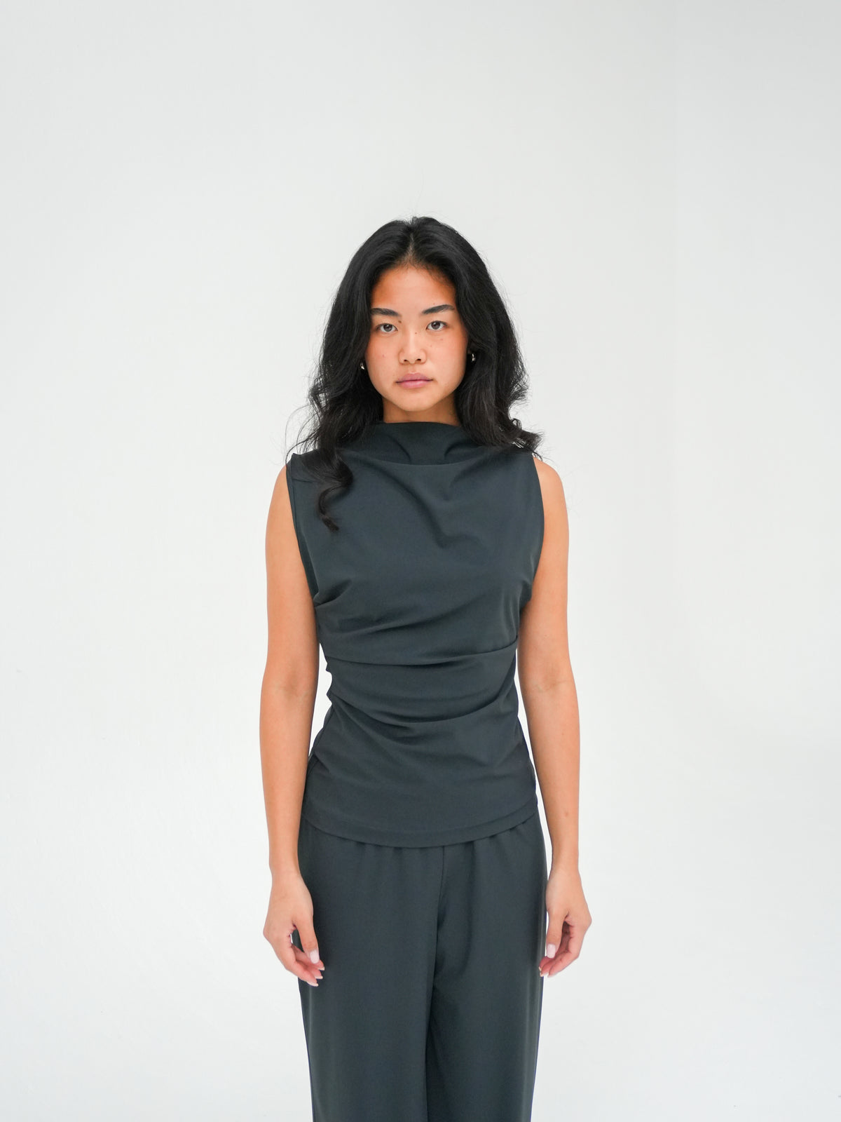 ASYMMETRIC SLEEVELESS TOP IN CHARCOAL BY REYÈM