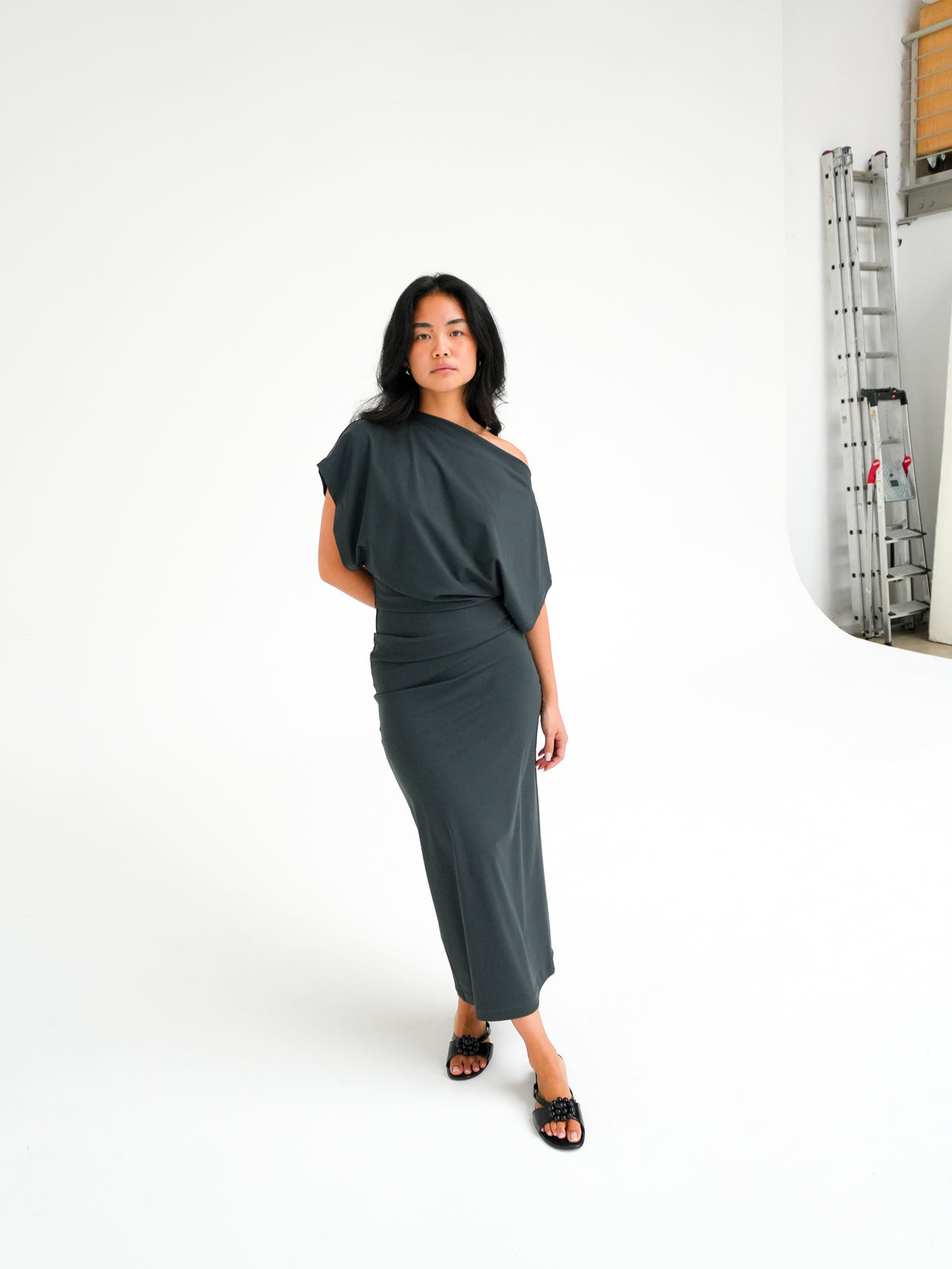 Draped Midi Dress in Charcoal by Reyèm