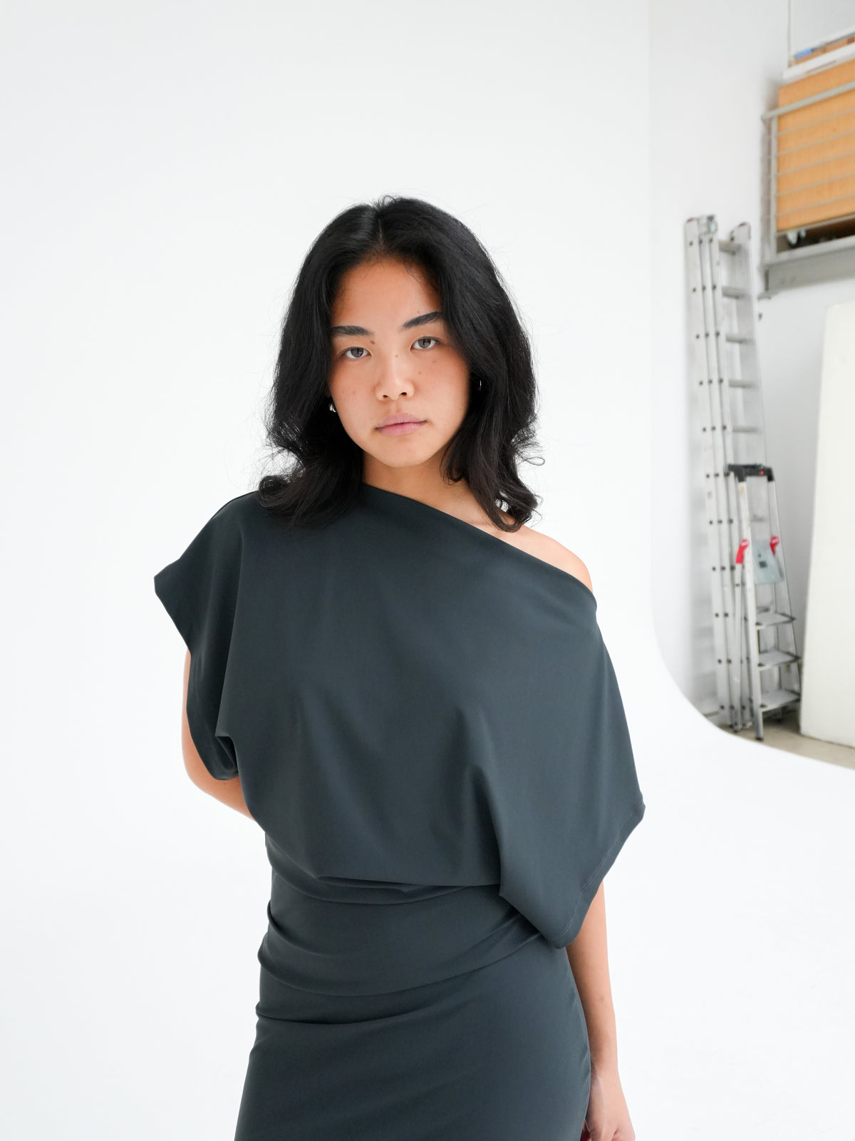 Draped Midi Dress in Charcoal by Reyèm