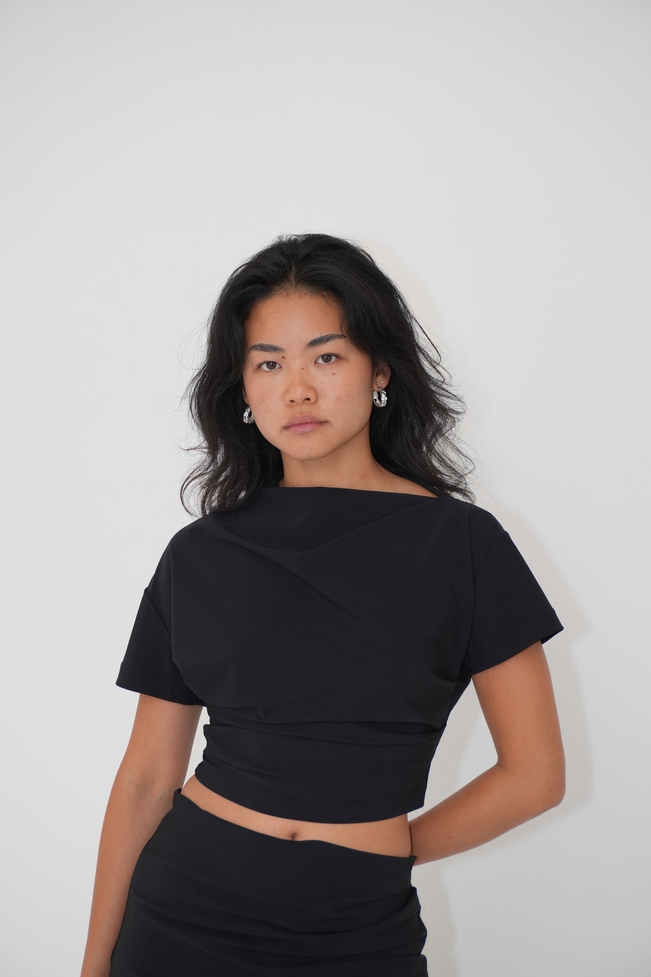 ASYMMETRIC CROPPED TOP BY REYÈM