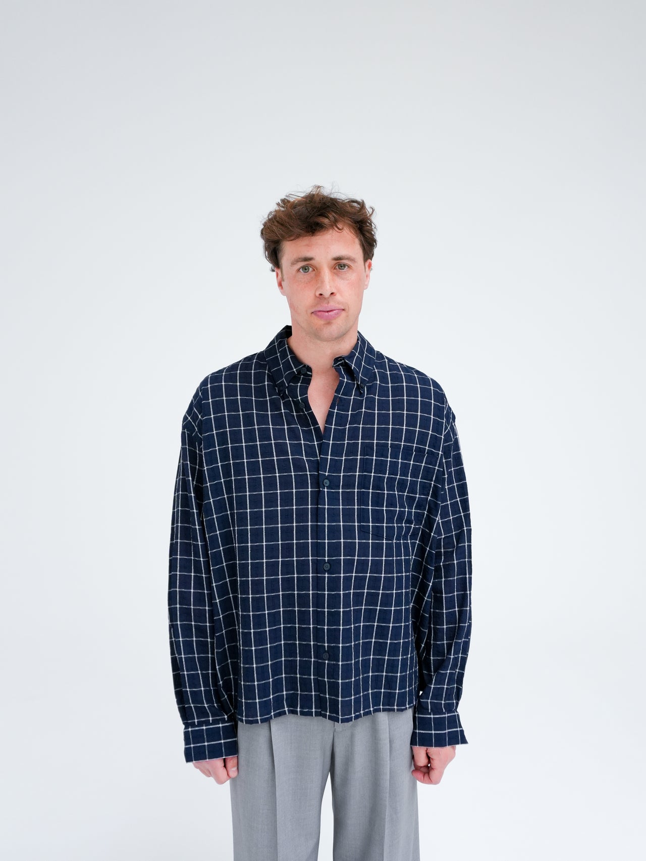 MAZA CHECK SHIRT IN NAVY BLUE BY WON HUNDRED