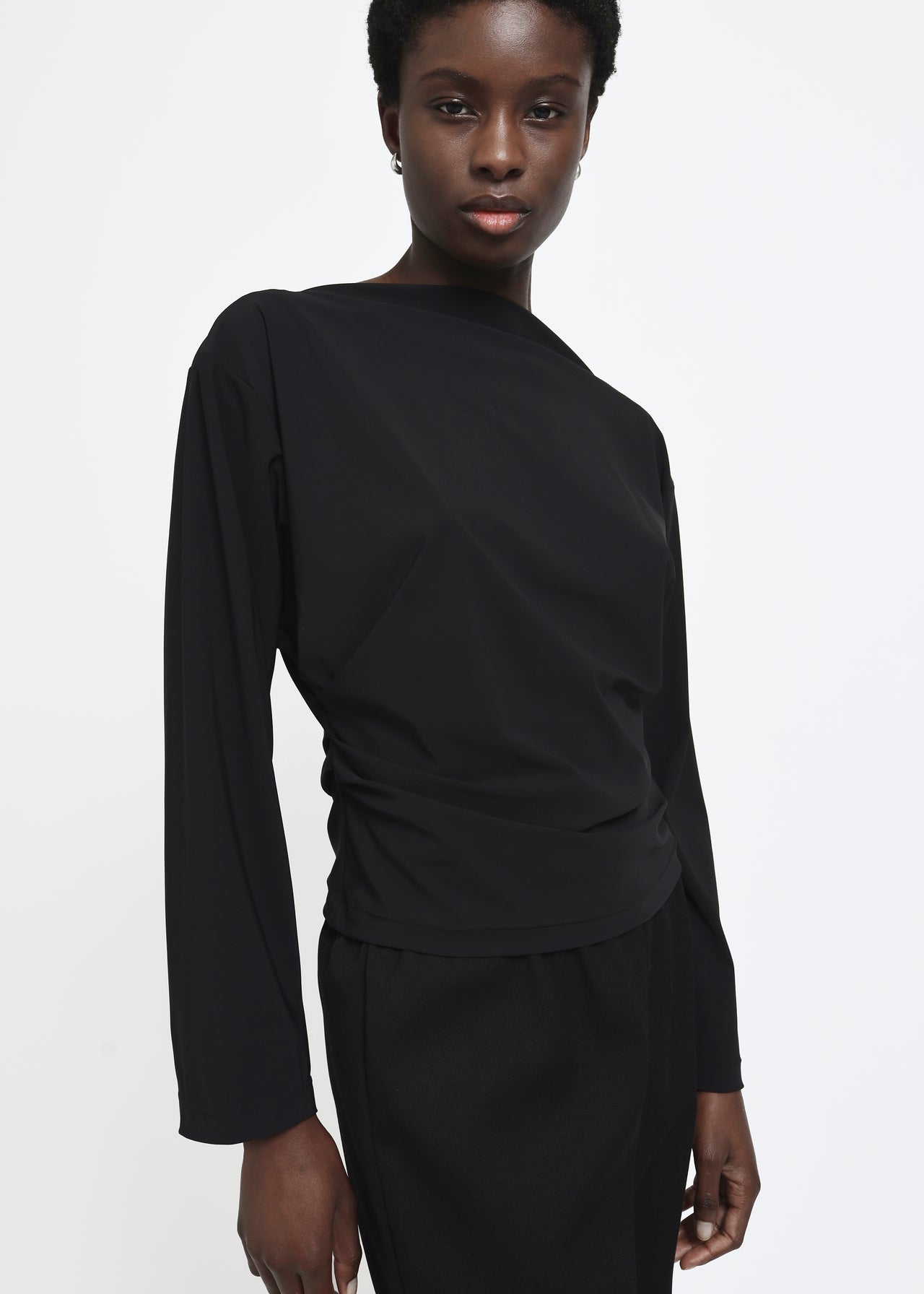 Draped Long Sleeve Top in Black by Reyèm