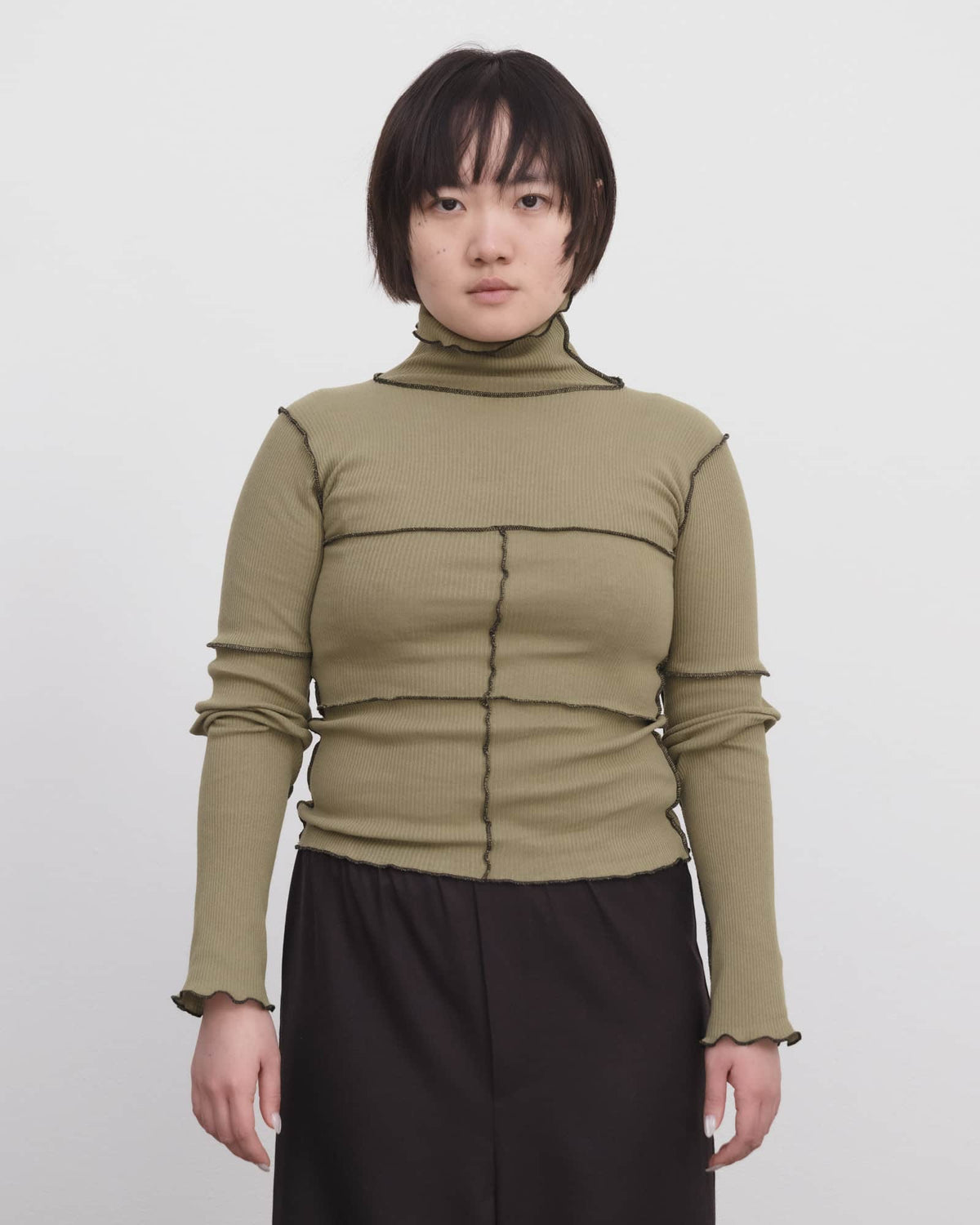 CINDER TURTLENECK IN MOSS GREEN BY BASERANGE