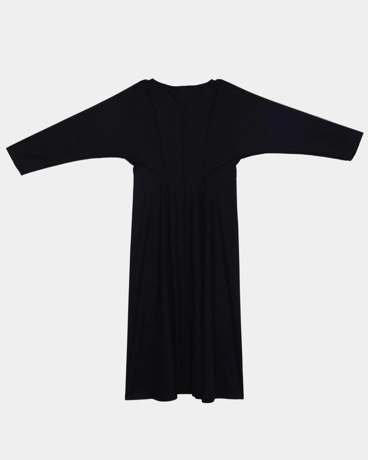 Black dress on a light gray background