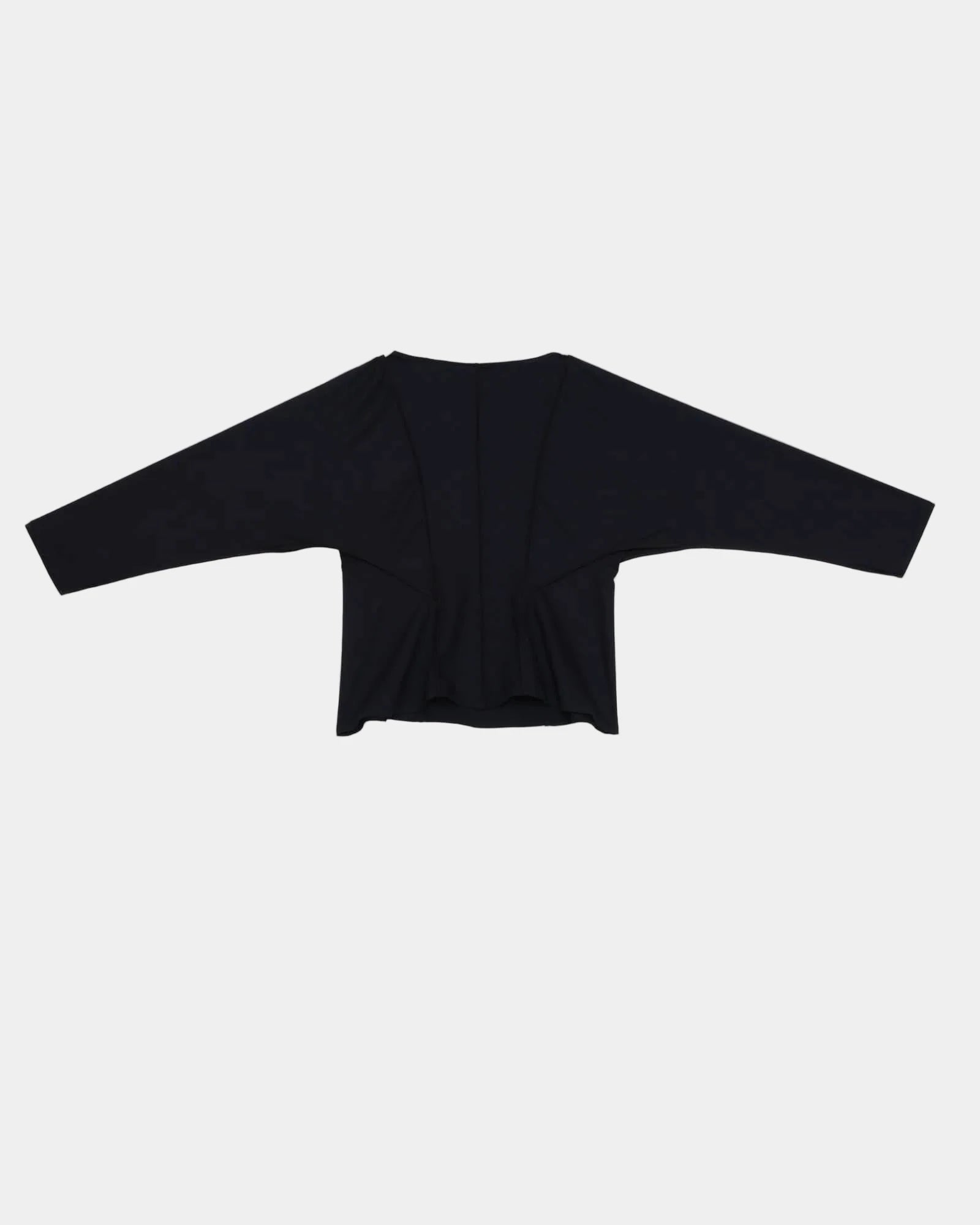 Black long-sleeve top on a light gray background