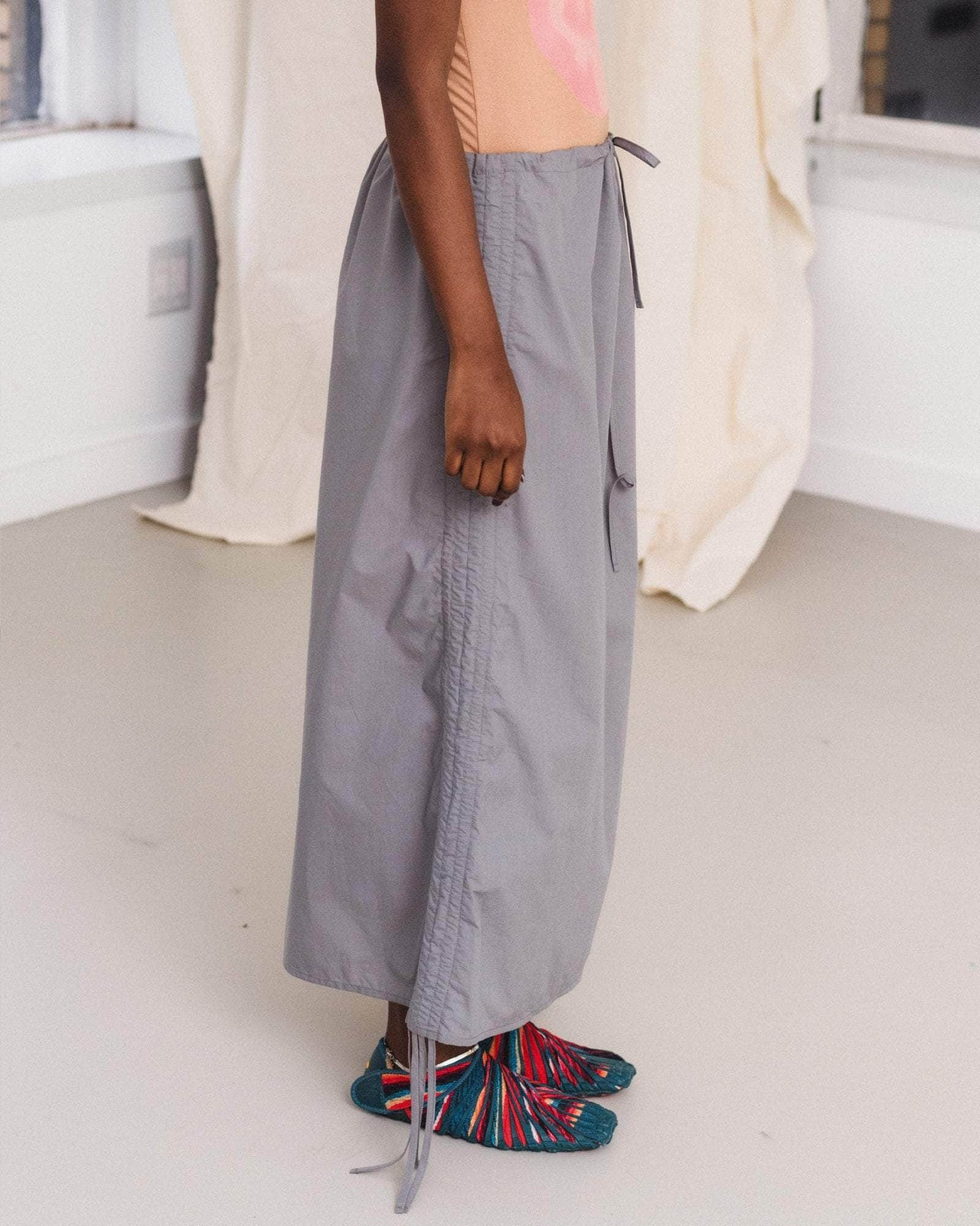 PICTORIAL STRAP SKIRT BY BASERANGE